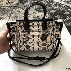 Black and white “python” mini crossbody. Brand new, never used Coach purse.